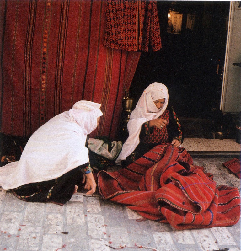 Gaza: women finishing kilims they have woven