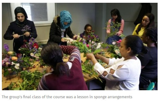 Still from video of refugee women being trained in floristry in London, UK