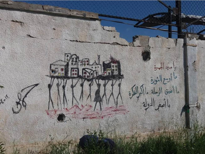 Graffiti in Homs, Syria, with Darwish poem