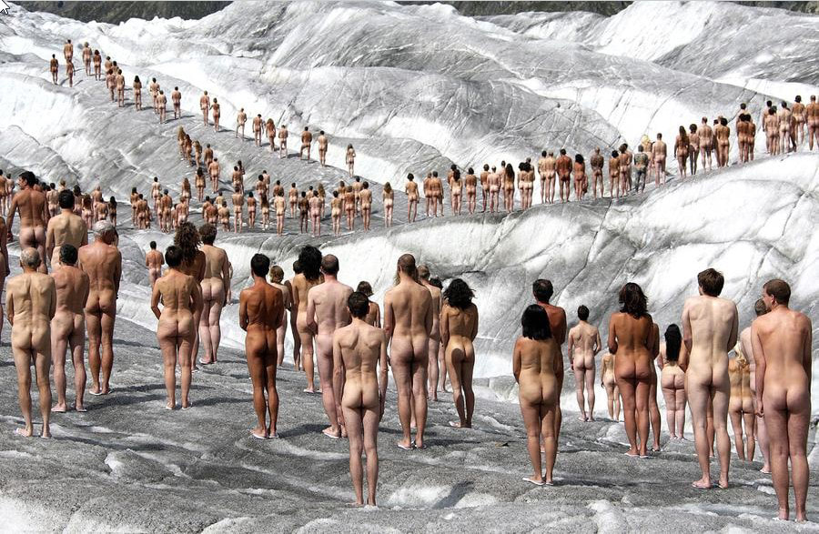 Artist Spencer Tunick group of naked people on a glacier.