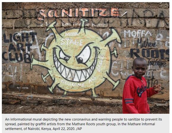 A mural showing a savage looking coronavirus with the message 