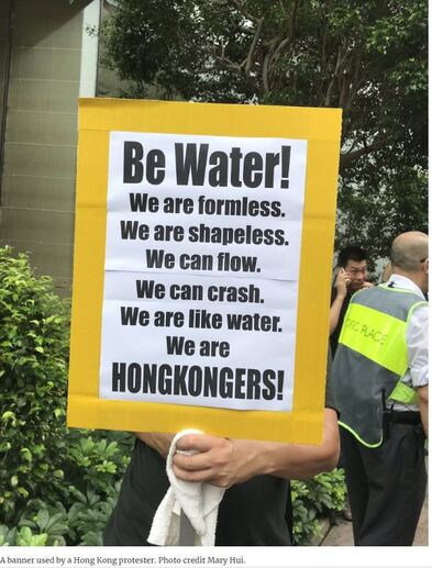 A poster exhorting protesters to be as quick and shapeless as water, to foil the police. 