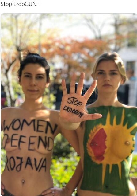 Two FEMEN naked activists in a Twitter post protesting Turkish President's Erdogan's attack on the Kurdish Rojava area on Syria. 